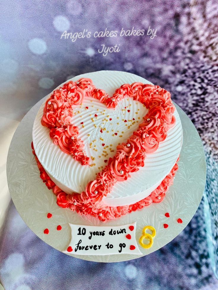 a heart shaped cake on top of a white plate