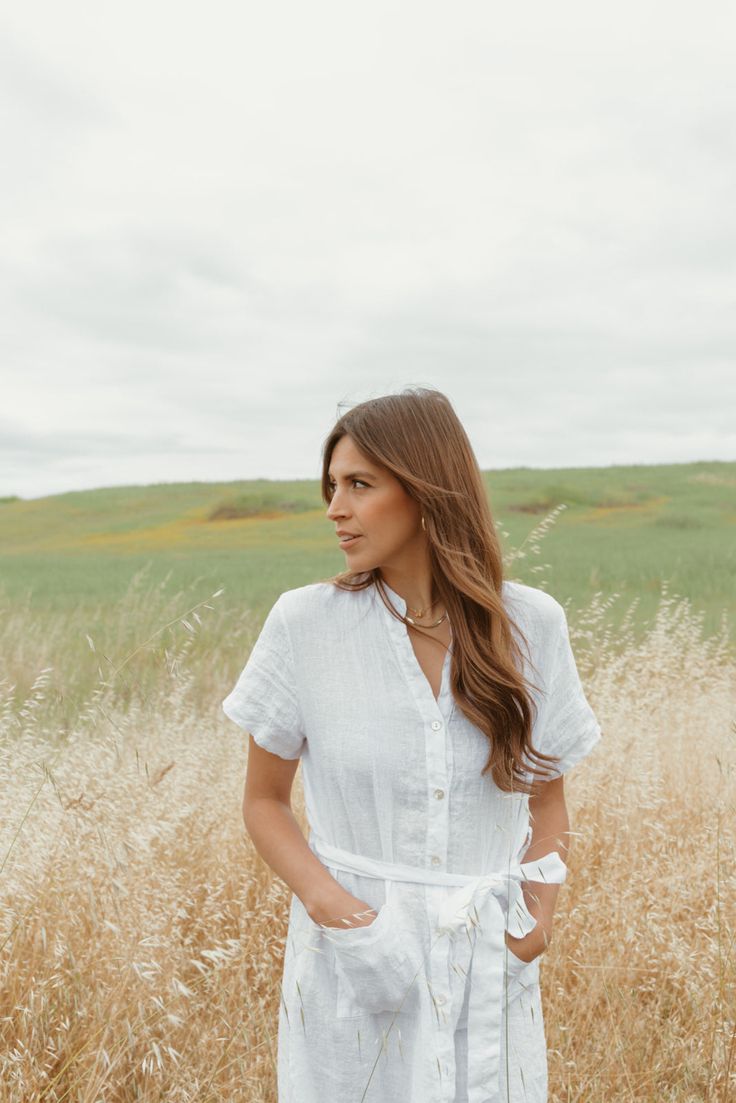 Beautiful Structured dress in a french linen fabric. Lined with shell buttons. Features front pockets and side slits on both legs. Such an easy breezy throw on and go piece for summer. Sizing Details: One size. Fits most comfortably between US sizes 2-10 Care Instructions: Gentle wash on cold and hang to dry. A steam is the best way to get wrinkles out of your linen. Chic Short Sleeve Linen Dress For Day Out, Summer Linen Midi Dress For Daywear, Knee-length Linen Shirt Dress For Day Out, Linen Midi Dress For Daytime In Spring, Casual Linen Midi Dress For Day Out, Casual Linen Midi Dress For Vacation, Daytime Linen Midi Dress, Linen Midi Dress For Daytime, Chic Linen Shirt Dress For Vacation