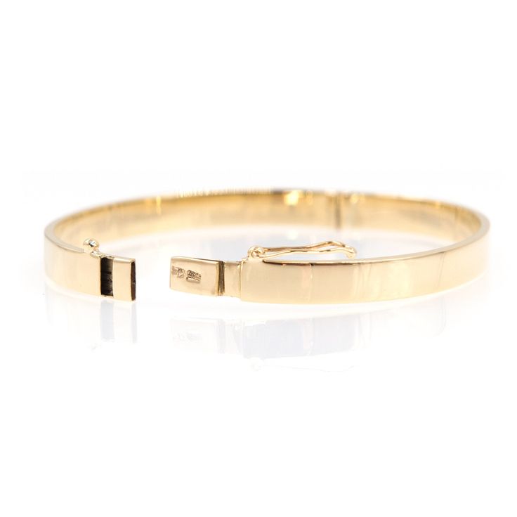 Plain Gold Hinged Bracelet, Gold 14k Oval Bracelet, 14k Real Gold Bangle, Wide Gold Cuff, 6 mm Hinged Bangle, Real Gold Engraved Bracelet This trendy bracelet will bring a minimalist, modern and fashion touch to your look. Elegant and simple in its design and therefore such a favorite piece and so easy to stack with other bracelets and bangles. This classic Real gold 14 karats-585 Oval bracelet is has a perfect subtle side closure. Bangle has oval shape and safe clasp . 14 KARATS STAMPED 585 Ban Modern 14k Gold Bracelets For Everyday Luxury, Modern 14k Gold Diamond Bracelet With Polished Finish, Modern Yellow Gold Diamond Bracelet With Polished Finish, Modern Yellow Gold Polished Diamond Bracelet, Modern Diamond Bracelet As A Gift, Modern Gold Bracelet With Polished Finish, Minimalist Gold Bracelet With Polished Finish For Everyday Luxury, Elegant Gold Bracelet With Open Band, Minimalist Polished Gold Bracelet For Everyday Luxury