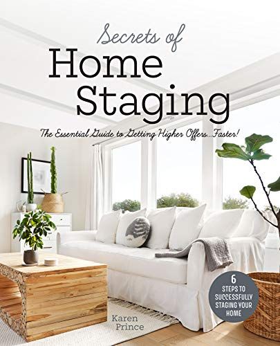 the cover of secrets of home staging, featuring a white couch and wooden coffee table