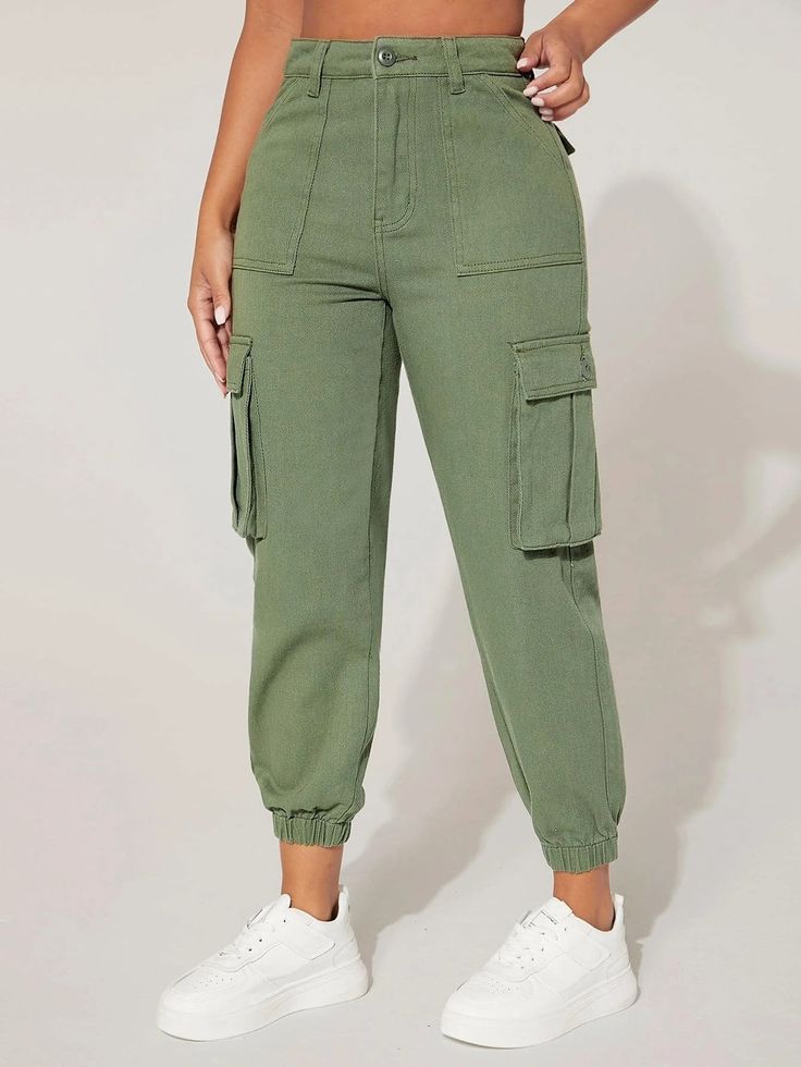 Make a statement in these High Waist Flap Pocket Cargo Jeans, perfect for fashion-forward individuals. The plain pattern and jogger style create a contemporary look that stands out from the crowd. Featuring a high waistline and a regular fit, these jeans provide comfort and a flattering silhouette. Details: Pattern Type: Plain Type: Jogger Jeans Style: Cargo Pants Closure Type: Zipper Fly Waist Line: High Waist Length: Cropped Fit Type: Regular Fit Fabric: Non-Stretch Material: Denim Body: Unlin Trendy Joggers With Elastic Waistband, Casual Mid-rise Cargo Pants With Elastic Waistband, Trendy Non-stretch Cargo Pants For Streetwear, Trendy Baggy Joggers For Fall, Trendy Green Joggers With Elastic Waistband, Trendy Spring Joggers, Trendy Streetwear Joggers With Cargo Pockets, Trendy Joggers With Pockets, Trendy Green Streetwear Joggers