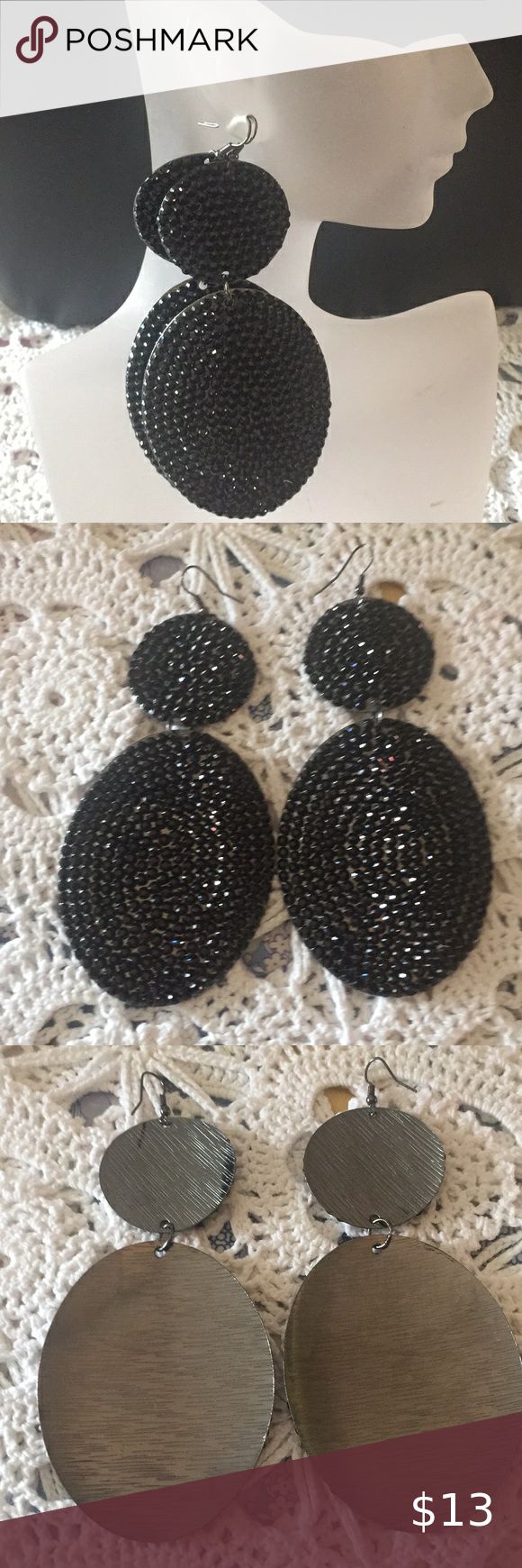 New Large Bold Black Sparkly Pierced Earrings New large, bold earrings with a dangle style and sparkle. In height, they measure 4 1/4 inches. Jewelry Earrings Black Beaded Earrings For Evening, Handmade Black Earrings For Party, Handmade Black Party Earrings, Black Beaded Party Earrings, Trendy Black Beaded Earrings, Trendy Black Dangle Beaded Earrings, Trendy Black Beaded Earrings For Party, Black Metal Drop Beaded Earrings, Handmade Black Crystal Earrings For Party