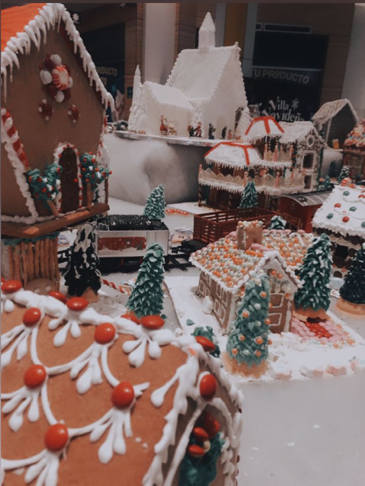 gingerbread houses and trees are on display