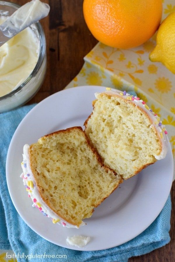 two slices of cake on a plate next to oranges