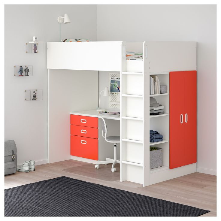 a white loft bed with black drawers and desk in the corner, next to a rug