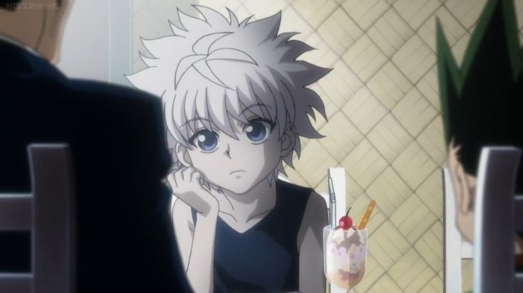 an anime character sitting at a table with a drink in front of him and another person looking on