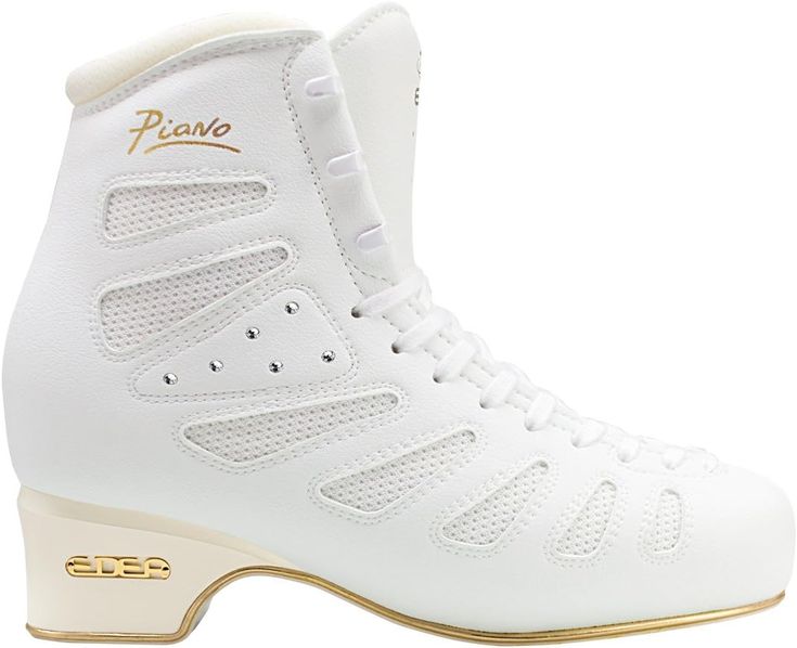 a pair of white roller skates with gold trimming on the bottom and sides