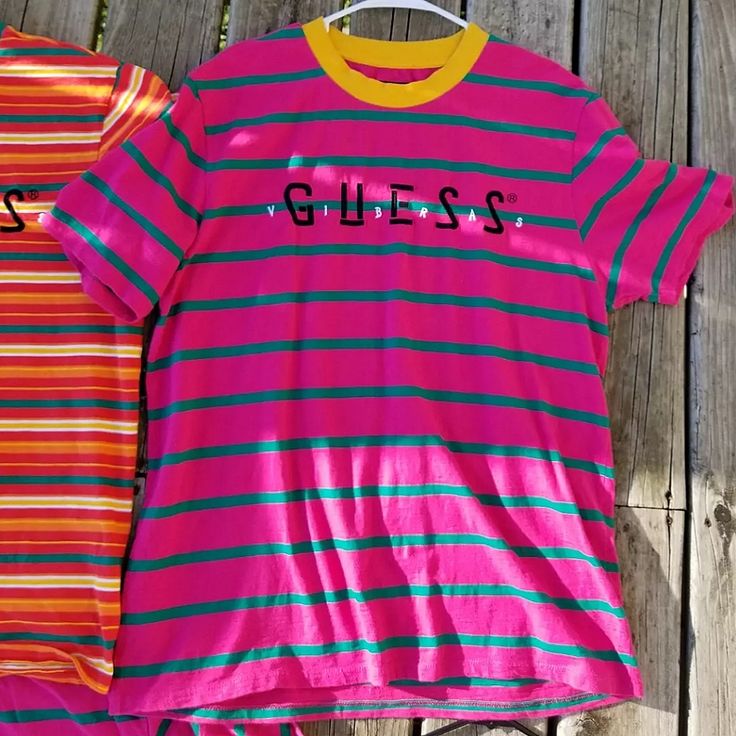 Guess Striped Mens T-Shirt! Spectacular Condition/Quality! Nwot No Holes, No Tears, No Rips, No Visible Stains, No Stress, No Stretching, No Fading, No Discoloration, No Discomfort Perfect For Any Streetwear Collector/Guess Mentor Like New Spring Pink T-shirt With Logo Print, Pink Relaxed Fit T-shirt With Logo Print, Pink T-shirt With Logo Print For Spring, Trendy Pink Shirt With Text Print, Pink Graphic Tee With Logo Print, Spring Striped T-shirt With Letter Print, Spring Striped Letter Print T-shirt, Retro Pink Top With Text Print, Pink Relaxed Fit Shirt With Text Print