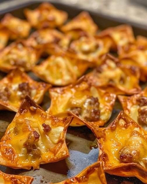 some food is sitting on a pan and ready to be cooked in the oven for consumption