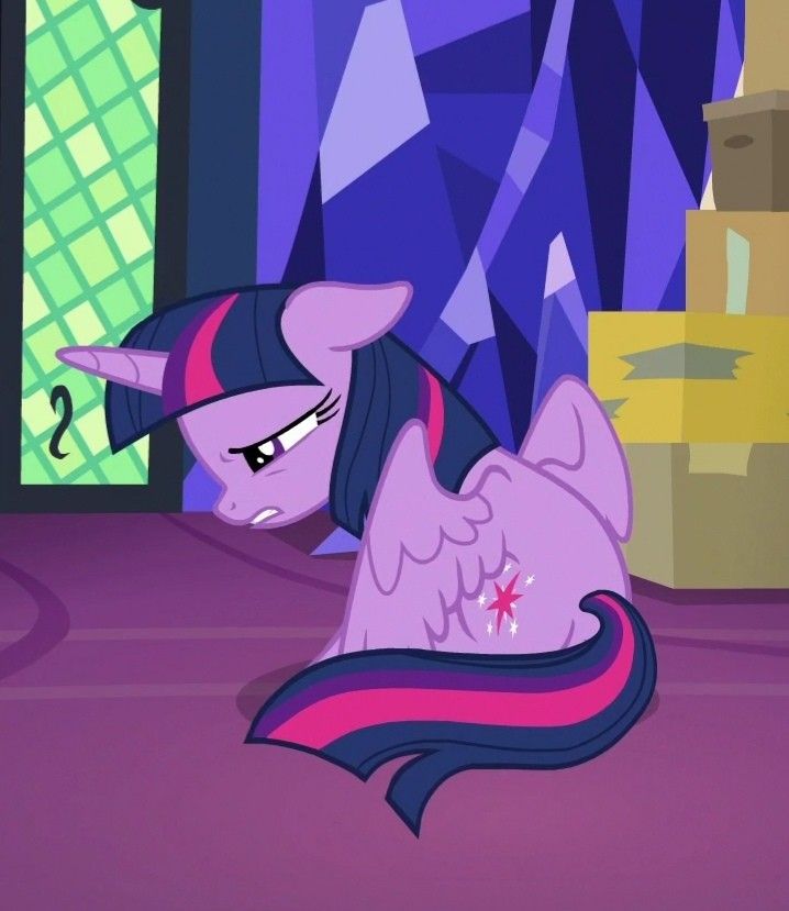 the pinkie pony is laying down on its back in front of a purple wall