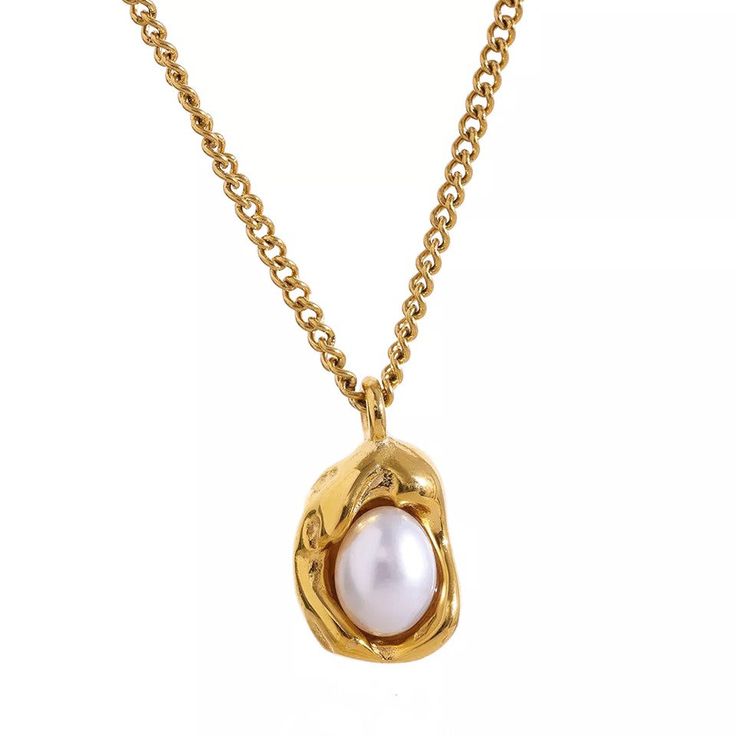 Introducing our exquisite natural pearl drop pendant necklace, adorned with a lustrous pearl and crafted in 18K gold PVD. This stunning piece showcases the timeless beauty of nature with its genuine pearl pendant, carefully selected for its iridescent glow and exceptional quality. Suspended from a delicate chain, the pearl drop pendant dangles gracefully, adding an elegant and sophisticated touch to any neckline. The 18K gold PVD setting enhances the radiance of the pearl, while providing a luxu Luxury Yellow Gold Pearl Pendant Necklace, Luxury Yellow Gold Necklaces With Pearl Pendant, Pearl Drop Pendant, Natural Pearl Necklace, Drop Pendant Necklace, Gold Pearl Necklace, Elegant Necklace, Real Pearls, Delicate Chain