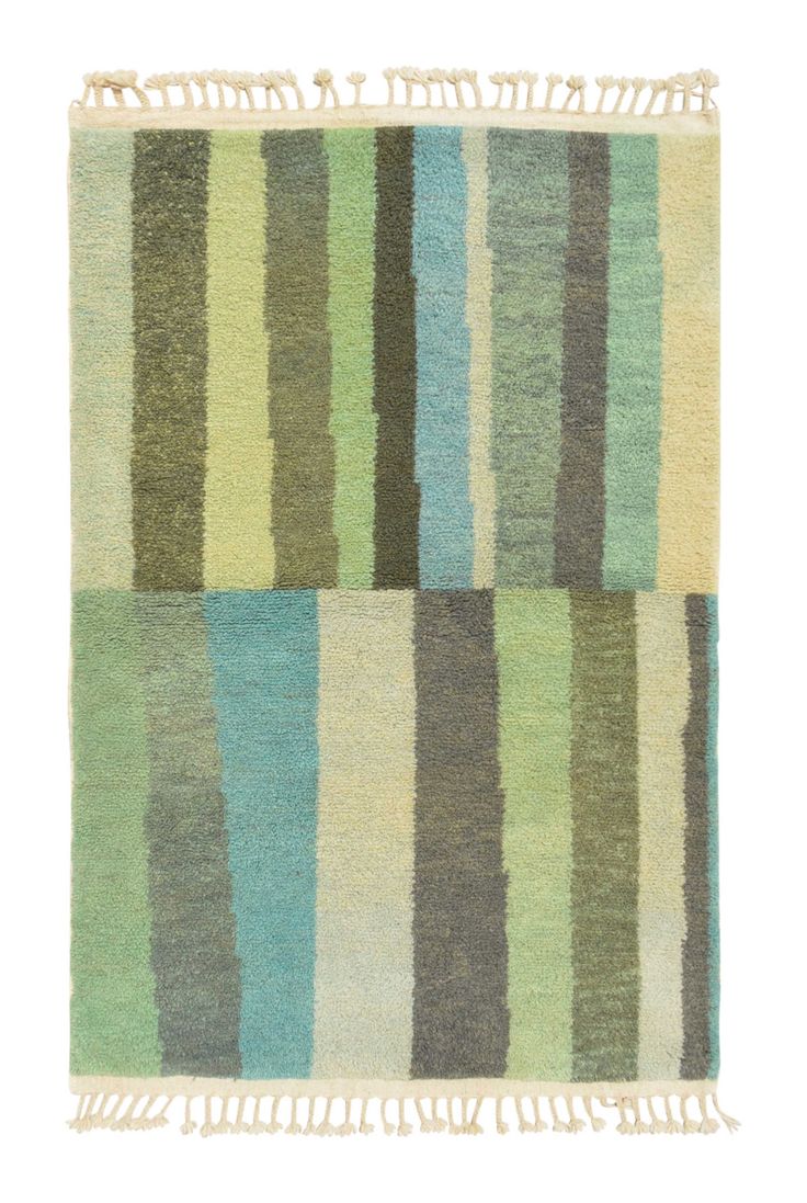 a multicolored striped rug with fringes on the bottom and one stripe at the top