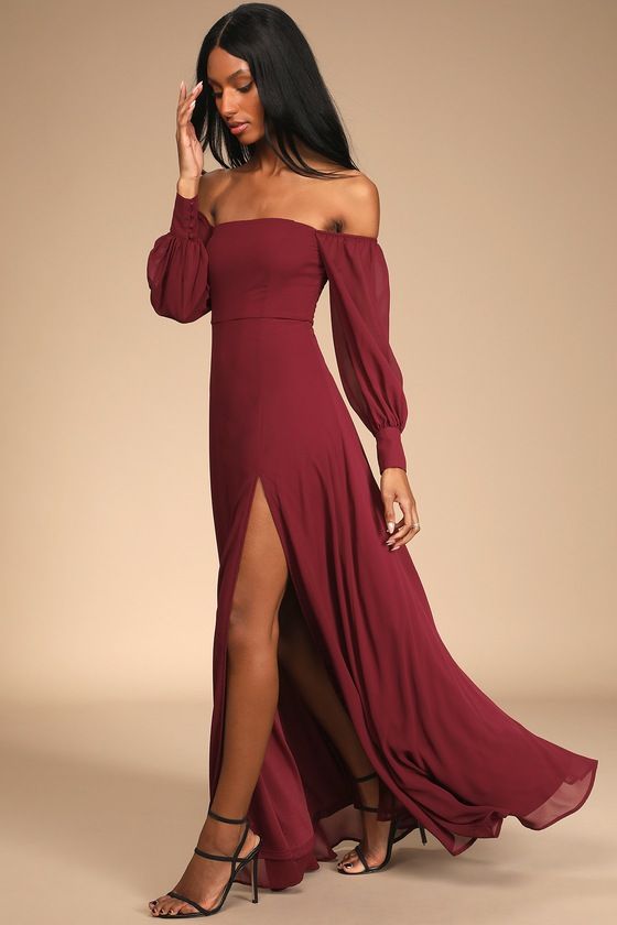 Instantly feel like you're in a fairy tale with the Lulus Feel the Romance Burgundy Off-the-Shoulder Maxi Dress! Lightweight gauzy woven chiffon shapes this spectacular dress that has an off-the-shoulder neckline and a fitted princess-seamed bodice (with hidden no-slip strips and supportive boning), all framed by long balloon sleeves with button cuffs and elastic at the shoulders. A high fitted waist tops a cascading maxi skirt with a thigh-high side slit to give this gown a little bit of a flir Pirate Bridesmaid Dress, Lulus Burgundy Dress, Long Sleeve Burgandy Bridesmaids Dresses, Maroon Wedding Dress Guest, Dark Red Long Sleeve Dress, Fall Wedding Guest Dress Long Sleeve, Ball Gown Dresses Long Sleeve, Winter Bridesmaid Dresses Sleeves, Maroon Wedding Guest Dress