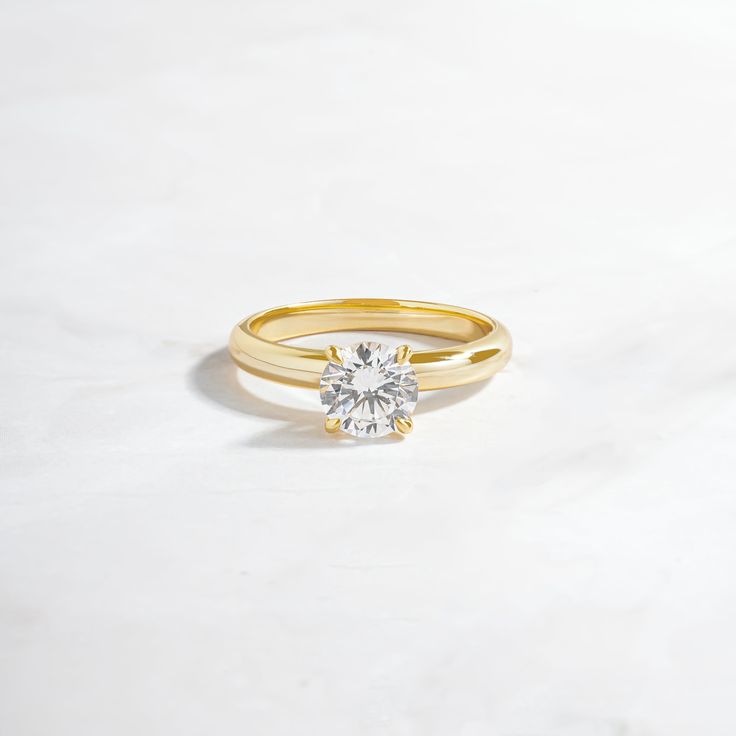 Engagement style ring featuring a round solitaire stone (1 ct size). It's a classic piece and great as a place holder for your engagement ring! • Made of 925 Sterling Silver• THICK plating of 14k Gold or Rhodium• Available in Sizes 4-12• Made of highest quality cubic zirconia• VERY HIGH QUALITY• Nickel-free & Hypoallergenic - will NOT turn fingers green!• 7mm Stone, 2.5mm Band Round Solitaire Ring, Round Solitaire Rings, Place Holder, Round Solitaire, Chunky Earrings, Engagement Style, Solitaire Studs, Chunky Rings, Celestial Jewelry