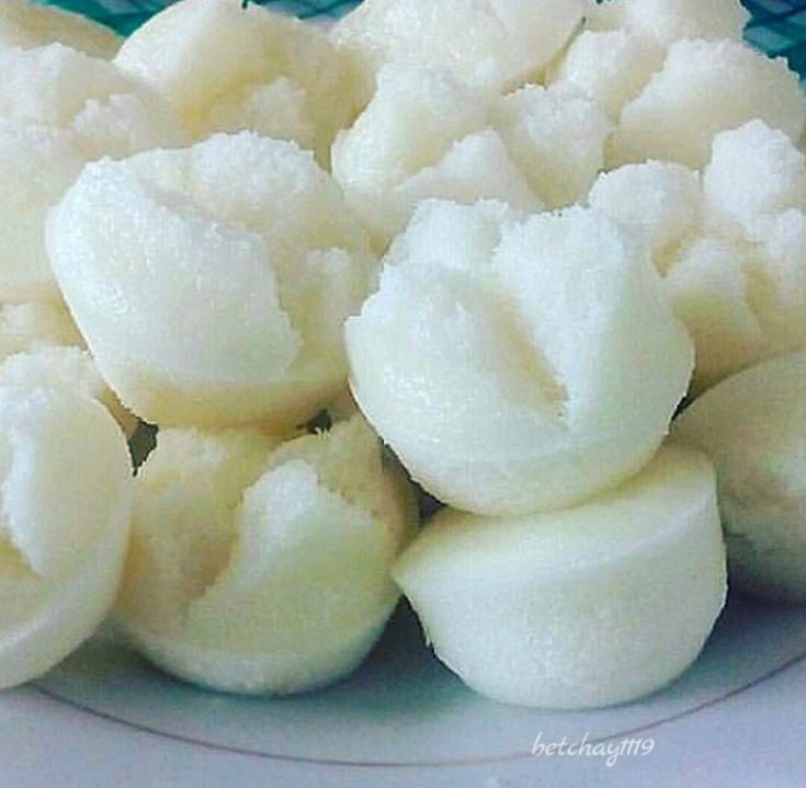 peeled bananas are sitting in a bowl on the table