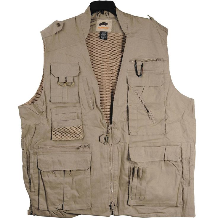 The CampCo Humvee Black Ranger Vest (3XL) has adjustable side tabs and side entry hand pocket. It is a 100% cotton ranger vest with mesh back and hideaway hood. It features wallet pocket with safety zipper and stand up collar with hideaway drawstring hood. | Campco Humvee Photo Vest Khaki Small Safari Photo Vest Photography Vest, Multi Pocket Vest, Safari Vest, Travel Vest, Safari Photography, Safari Photo, Hunting Vest, Tan Guys, Tactical Vest