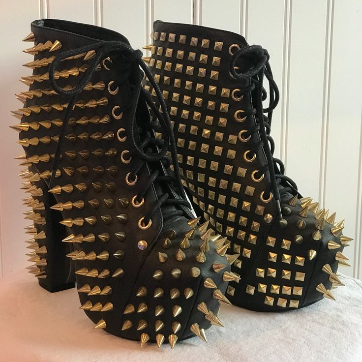 Black And Gold Jeffrey Campbell Lita Spike. Worn Only 1 Time. No Spikes Missing. I Do Not Have The Original Box, Dust Bag Or Extra Spikes. Size 5. Black Punk Round Toe Heels, Black Punk Style Heels With Round Toe, Punk Lace-up Heels For Party, Punk Lace-up Party Heels, Punk Style Lace-up Party Heels, Edgy Heels With Rivets And Round Toe, Black High Heel Boots With Rivets, Edgy Black Heels With Rivets, Punk Heels With Spikes And Round Toe