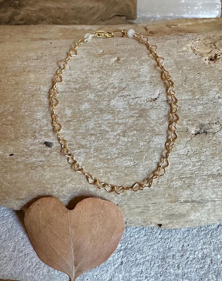 Gold filled 6.5" bracelet with dainty heart charm chain Delicate Heart Bracelet With Delicate Chain, Delicate Heart-shaped Bracelets With Adjustable Chain, Adjustable Delicate Heart Charm Bracelet, Dainty Heart Bracelet With Delicate Chain For Valentine's Day, Dainty Chain Jewelry For Valentine's Day, Dainty Valentine's Day Jewelry Chain, Heart-shaped Chain Bracelet As A Gift, Delicate Heart Bracelet With Delicate Chain For Everyday, Delicate Heart Bracelet With Chain For Everyday Wear