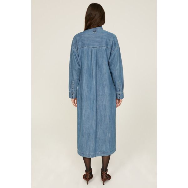 Blue denim (100% Cotton). Shirt dress. Long sleeves. Collar. Front button closure. 49" from shoulder to hemline. Imported. Medium Wash Button-up Dress For Daywear, Oversized Long Sleeve Medium Wash Denim Dress, Spring Denim Shirt Dress With Button Closure, Oversized Long Sleeve Denim Dress In Medium Wash, Denim Shirt Dress For Work And Fall, Indigo Button-up Cotton Denim Dress, Medium Wash Button Closure Shirt Dress For Spring, Collared Medium Wash Shirt Dress For Work, Medium Wash Relaxed Fit Shirt Dress For Work