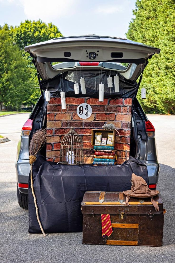 the trunk of a car is filled with luggage