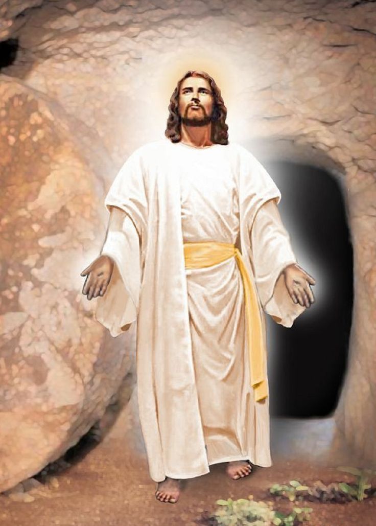 the jesus is standing in front of a cave