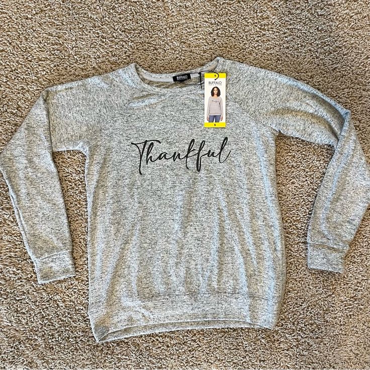 Buffalo David Bitton Thankful Cozy Crewneck Top Ultra Soft Gray Size Small Brand New Measurements In Photos Color: Heather Grey Thankful Super Soft Cozy Crewneck With Relaxed Fit & Banded Hem Ultrasoft Fabric Blend Crewneck Top Raglan Long Sleeves Banded Hem And Cuffs Relaxed Fit 76% Viscose 19% Polyester 5% Elastane Gift, Friends, Grateful From No Pet No Smoke House Gray Cozy Fit Top For Fall, Cozy Fit Gray Top For Fall, Cozy Gray Tops With Letter Print, Cozy Gray Top With Letter Print, Heather Grey Cozy Fit Top For Fall, Cozy Fit Heather Grey Top For Fall, Cozy Gray Letter Print Top, Gray Letter Print Sweater For Fall, Comfortable Gray Sweater For Fall