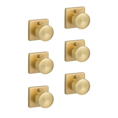 six knobs on the side of a white wall