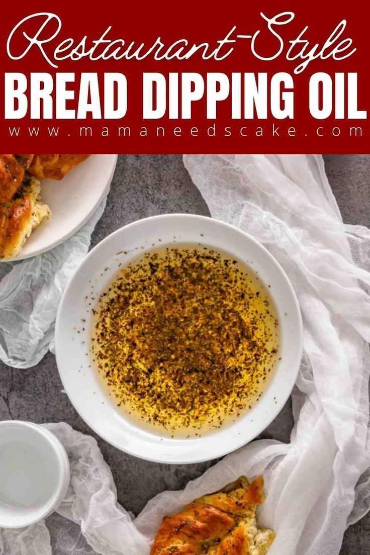 a bowl of bread dipping oil next to two plates with pizza on them and the words, restaurant style bread dipping oil