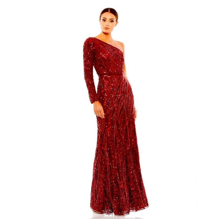 a woman in a long red dress with one shoulder and sequins on it