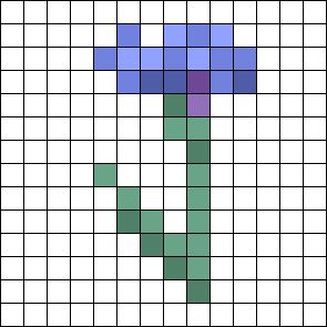 a cross stitch pattern with blue and green squares in the shape of a letter t