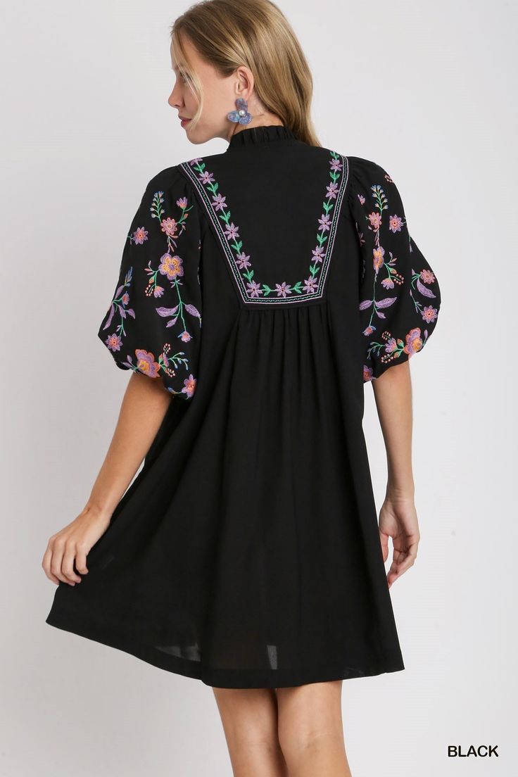 Get ready to turn heads in our stunning Ruffle Neck Embroidered Dress! With its ruffled V-neck, puff elbow sleeves, and colorful embroidery, this Umgee brand dress is sure to make a statement. Perfect for any occasion, this black dress will add a touch of playfulness and elegance to your wardrobe. Colorful Embroidery, Brand Dress, Elbow Sleeve, Embroidered Dress, Dress Brands, Boutique Clothing, Online Boutique, Black Dress, V Neck