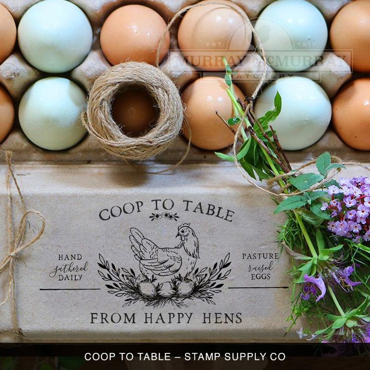 an egg carton filled with eggs and flowers