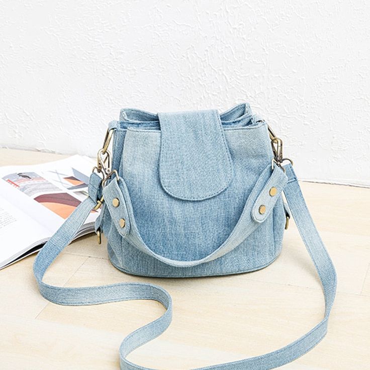 Denim Jeans Bag Cool Girl Bucket Bag Types of bags: Shoulder & Crossbody Bags Shape: Bucket Pattern Type: Solid Occasion: Versatile Number of Handles/Straps: two Main Material: Denim Lining Material: Polyester Item Type: Handbags Interior: Interior Slot Pocket, Cell Phone Pocket, Interior Zipper Pocket, Interior Compartment Hardness: Soft Handbags Type: Shoulder Bags Decoration: Rivet Closure Type: Zipper Size: Size: 26cm*21cm* 19cm(W*H*T)Shoulder strap 120CM Bag Types, Blue Handkerchief, Leather Bags Women, Yellow Purses, Waterproof Tote, Purple Purse, White Shoulder Bag, Womens Designer Handbags, Blue Purse