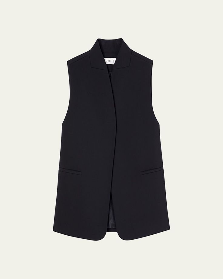 Rohe solid woolblend jacket     Stand collar    Sleeveless    Hip welt pockets     Relaxed, boxy fit     Hem falls to the hip    Concealed buttonfront     Wool/polyester    Lining: Viscose    Dry clean, professional cleaning recommended    Imported