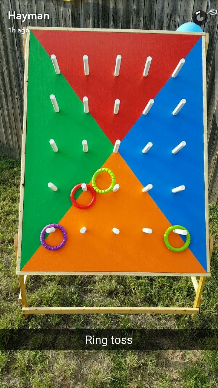 an outdoor game with rings on it and the words ring toss in front of it