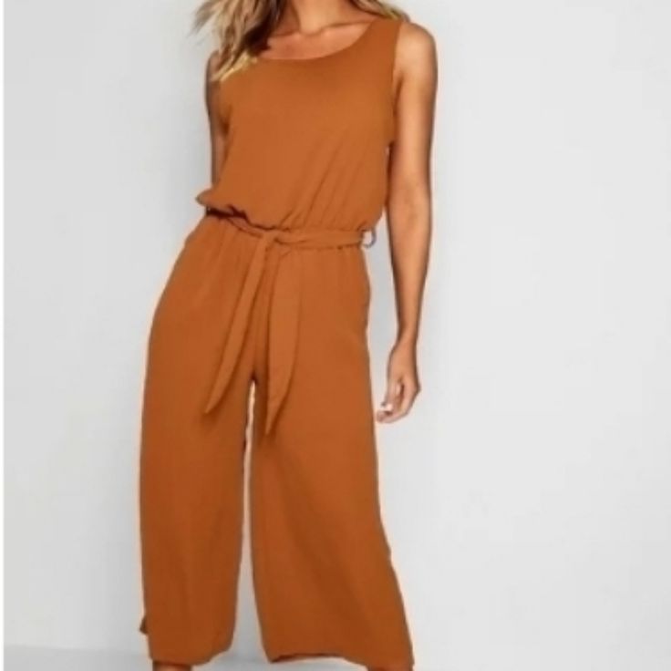 Woven Sleeveless Culotte Jumpsuit Brown Sleeveless Summer Jumpsuits And Rompers, Sleeveless Brown Jumpsuits And Rompers For Beach, Sleeveless Brown Jumpsuits And Rompers For Summer, Sleeveless Brown Jumpsuit For Beach, Sleeveless Brown Jumpsuit For The Beach, Brown Sleeveless Summer Jumpsuit, Sleeveless Brown Jumpsuits For Workwear, Brown Sleeveless Jumpsuits And Rompers For Vacation, Sleeveless Brown Jumpsuit For Vacation