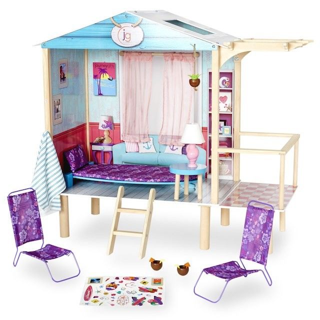 a doll house with furniture and accessories