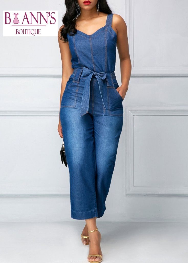 This chic denim jumpsuit is perfection. Featuring wide shoulder straps, a wide belt at a gathered waist, flare legs that end just above the ankle, back pockets and front pockets .... yes, FRONT POCKETS! This jumpsuit pairs perfectly with wedges, heels or sandals. Made with a polyester, spandex and denim blend for comfort and style, while hugging your every curve. Jeans And Bodysuit, Denim Jumpsuits, Moda Denim, Jeans Overall, Blue Jumpsuits, Jumpsuit Fashion, Denim Jumpsuit, Denim Fashion, African Fashion