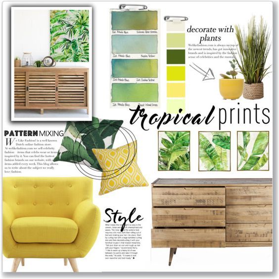 a yellow chair sitting next to a green plant and some pictures on the wall above it