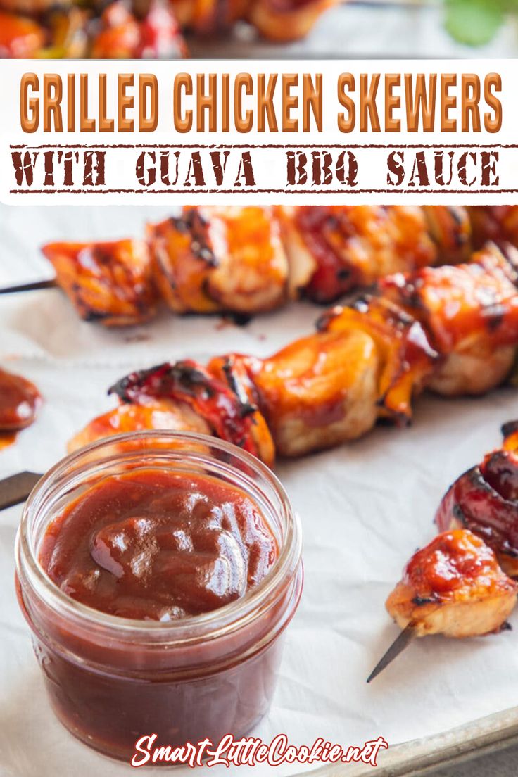 grilled chicken skewers with guava bbq sauce in a glass jar