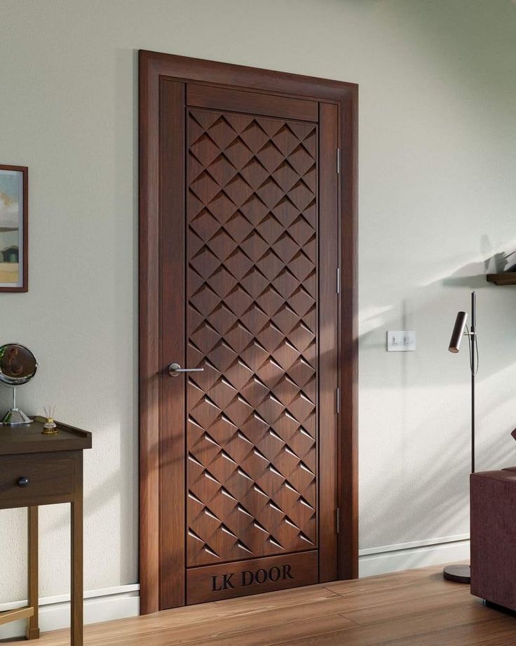 a wooden door in the corner of a room