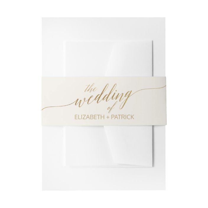 a wedding card with the word'the wedding'printed on it in gold ink