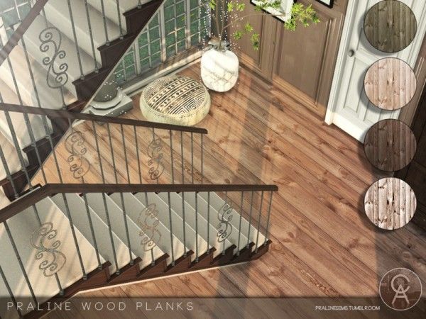 an aerial view of a stair case with wood planks and metal handrails