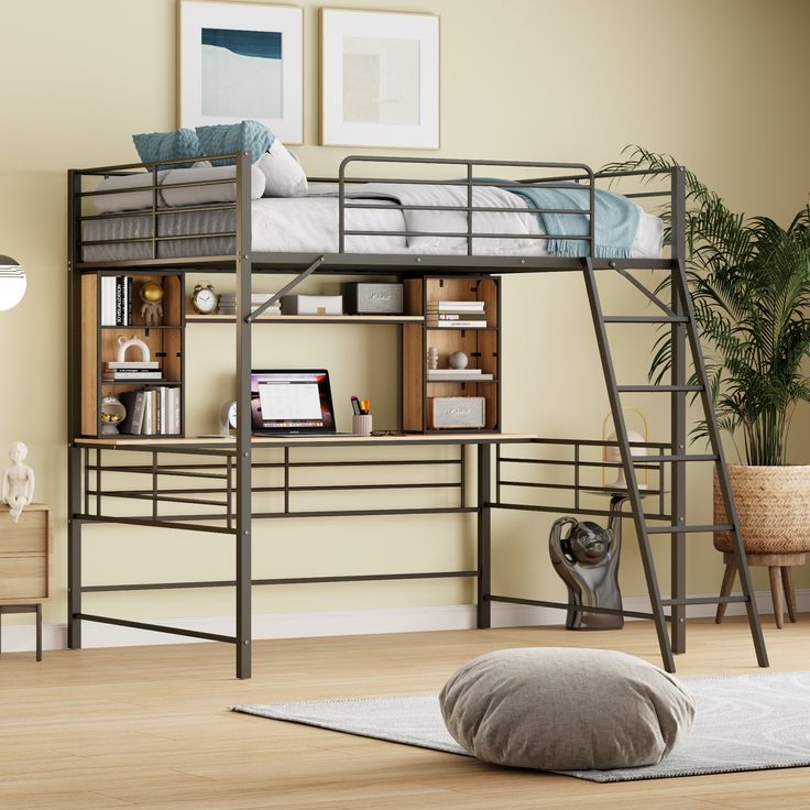 a loft bed with desk underneath it in a room