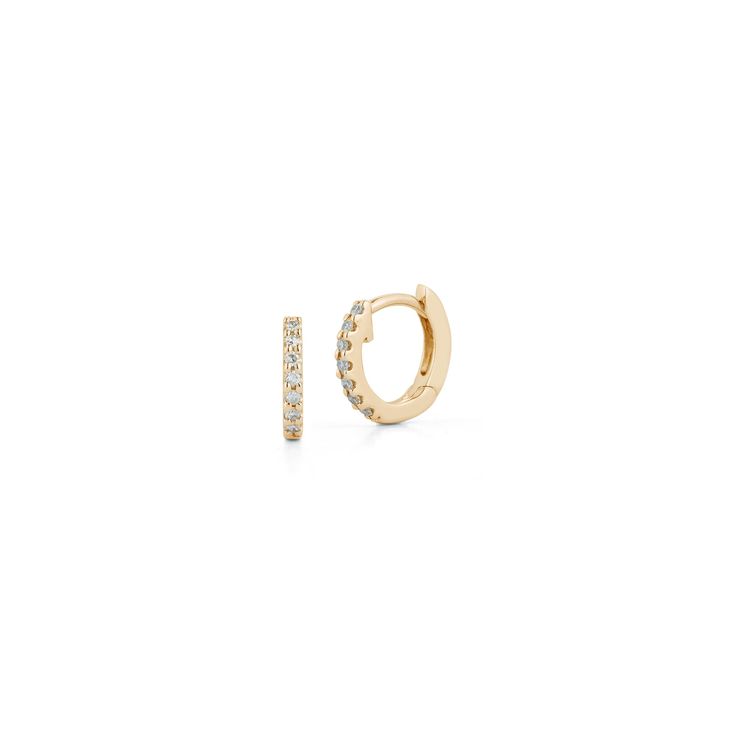 These pavé-set diamond and gold mini huggie earrings are a perfect size for those looking to fill 2nd, 3rd, 4th etc. piercings, or for those with petite earlobes. These diamond huggies hug your earlobe just right and are a brilliant addition to your ear stack. For most people, the mini huggies will fit in your second or third piercing, but some can wear these in their first hole. These diamond huggie earrings are the everyday staple earrings you've been hunting for. They are a favorite of the Da Yellow Gold Diamond Huggie Earrings With Pave Setting, 14k Gold Huggie Earrings With Pave Setting, Fine Jewelry Huggie Earrings With Pave Setting, Minimalist Yellow Gold Huggie Earrings With Pave Setting, Third Piercing, Staple Earrings, Dana Rebecca Designs, Diamond Huggie Earrings, Diamond Huggies