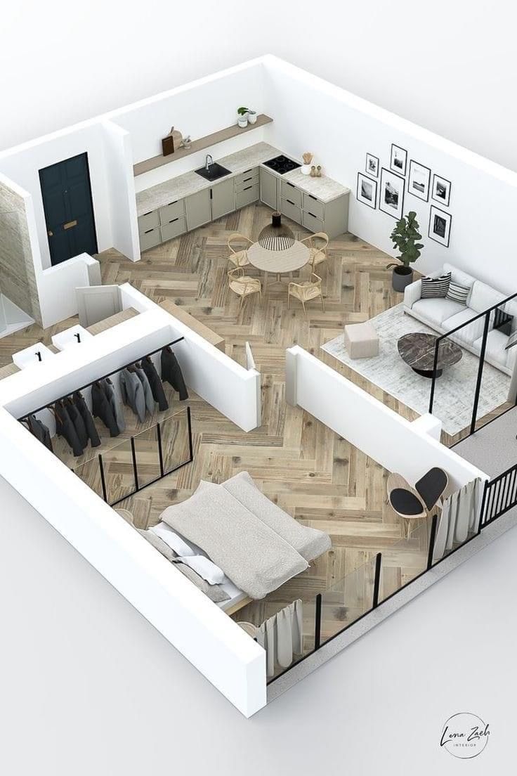 the floor plan of a modern apartment with white walls and wood floors, including an open living area