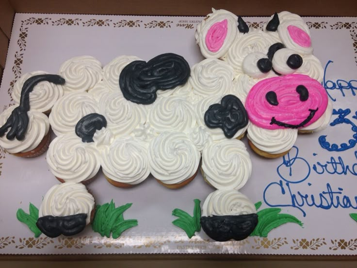 a birthday cake made to look like a cow