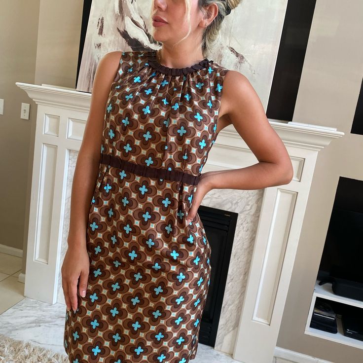 Beautiful Dress Size 12 . Chic Fitted Brown Dress, Brown Midi Length Sleeveless Dress For Spring, Fitted Brown Sleeveless Dress For Spring, Chic Brown Mini Length Sleeveless Dress, Fitted Sleeveless Brown Dress, Brown Mini Length Casual Dress, Brown Sheath Midi Dress For Spring, Casual Knee-length Brown Dress, Retro Brown Midi Dress