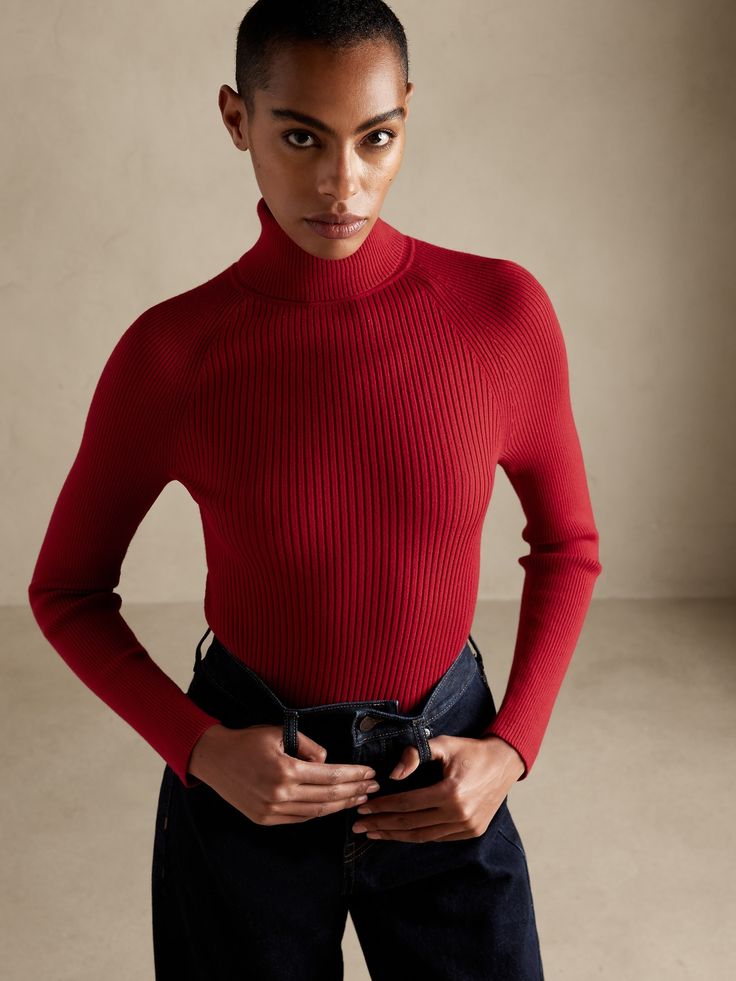 The perfect layering piece, this long-sleeved turtleneck style is crafted with a raglan shoulder seam for a subtly sporty twist.  FITTED: Stretches to fit.  Turtleneck.  Allover ribbed stitch.  Straight hem.  SUSTAINABILITY: Made with LENZING™ ECOV Ribbed Mock Neck Top For Workwear In Winter, Winter Ribbed Mock Neck Top For Workwear, Fitted Mock Neck Top With Ribbed Neckline For Winter, Classic Stretch Mock Neck Top For Winter, Fitted Ribbed Mock Neck Top For Winter, Winter Fitted Mock Neck Top With Ribbed Neckline, Ribbed Knit Turtleneck For Workwear, Stretch Turtleneck With Ribbed Cuffs For Work, Classic Ribbed Tops For Fall