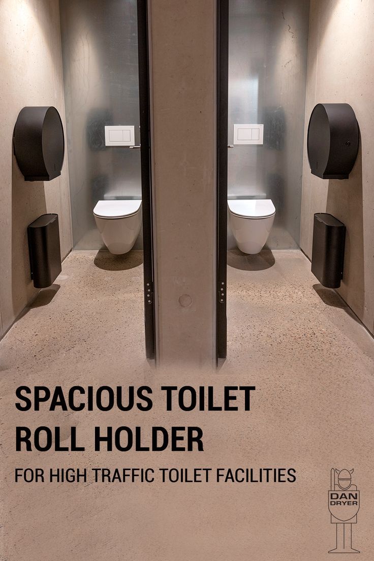 two toilets in a bathroom with the caption spacious toilet roll holder for high traffic toilet facilities